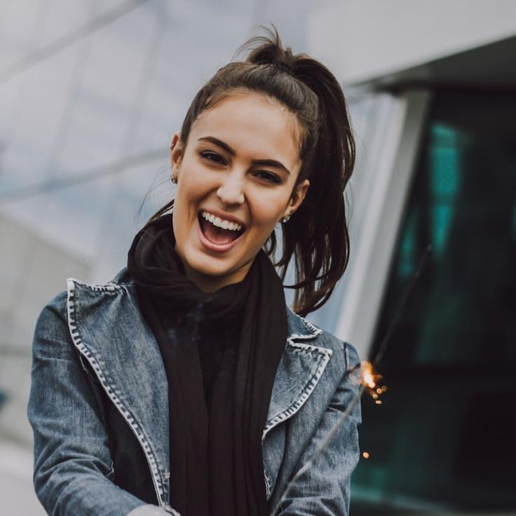 Alex Rivera, Lead Design Curator at PearlRidgeHarbor, reviewing corporate floral arrangements